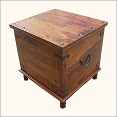 a wooden box with metal studs on the top and bottom, sitting upright against a white background