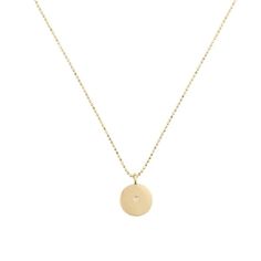 DescriptionA petite version of our classic Circle Pendant, the Little Circle Pendant Necklace features a single diamond at the center of a gold disc hanging from a faceted bead chain. Simplicity at its best.Handmade with love in Los Angeles.Featured on: Karlie Kloss.Measurements & Materials14k yellow goldCharm: 1/3"Number of Stones: One 1 pt. diamondSize of Stones: 1.5 mmTotal Carat Weight: .015 Circle Necklaces, 3 Number, Gold Circle Necklace, Engraved Pendant, Gold Disc, Circle Pendant Necklace, Gold Number, Dope Jewelry, Karlie Kloss