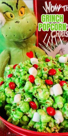 the grinch popcorn is green and red with marshmallows