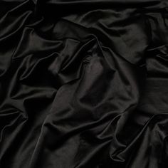 the black fabric is very soft and shiny