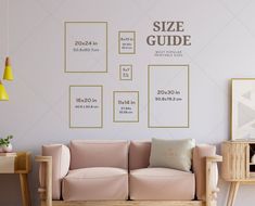 a living room with white walls and pink furniture in front of the large size guide on the wall