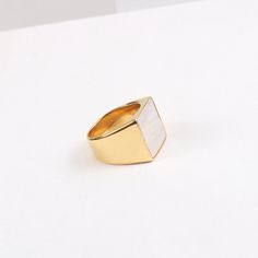 This 18K Gold Plated Large Square Mother-of-Pearl Ring is a luxurious, statement-making piece. Featuring a chunky gold band with both mother-of-pearl and black onyx accents, it's the perfect unique gift for any special occasion. This signet ring is also an ideal stacking ring for daily wear. [MATERIAL]: Yellow brass with real 18k gold plated. Our ring will not tarnish or turn green.[PLEASE NOTE]: Each shell color is unique so the shade and color might slightly vary. Elegant Gold Rings With Mother Of Pearl, Gold Mother Of Pearl Rings For Anniversary, Gold Mother Of Pearl Anniversary Rings, Gold Mother Of Pearl Ring For Gift, Gold Mother Of Pearl Ring As A Gift, Modern Gold Jewelry With Mother Of Pearl, Clean Sterling Silver, Shell Color, Wide Band Ring