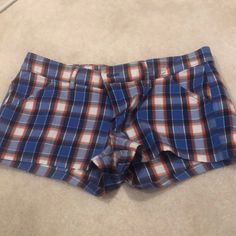 Hollister Plaid Shirts In Royal Blue With Orange And White . Size 1. Brand New With Tags . Casual Plaid Shorts, Fitted Plaid Casual Shorts, Fitted Casual Plaid Shorts, Hollister Jean Shorts, Cuffed Denim Shorts, Plaid Shirts, Hollister Shorts, Orange Plaid, Mid Rise Shorts