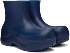 Ankle-high waterproof biodegradable rubber boots in blue. · Bonded jersey lining · Textured rubber midsole · Treaded rubber outsole Supplier color: Cruise Blue Waterproof Boots For Rainy Weather, Blue Weatherproof Boots For Rainy Weather, Weatherproof Blue Boots For Rainy Weather, Blue Round Toe Rain Boots, Insulated Blue Rain Boots For Outdoor, Blue Outdoor Boots With Rubber Sole, Blue High-top Waterproof Boots, Puddle Boots, Rubber Boots