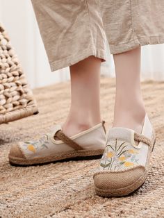 Radiate beachy vibes with every step wearing this slip-on espadrille that showcases a stripe motif and cross-strap. A rubber sole keeps your footing sure as you navigate slippery terrain. Slip-on Canvas linen upper Man-made lining Natural straw mat breathable insole Rubber sole Summer Closed Toe Espadrilles, Beige Flats With Woven Sole For Spring, Beige Round Toe Espadrilles For Beach Season, Spring Bohemian Flats With Round Toe, Bohemian Spring Flats With Round Toe, Spring Beige Slip-on Flats, Bohemian Round Toe Flats For Spring, Beige Slip-on Flats For Spring, Trendy Closed Toe Espadrilles For Beach Season