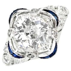 an old cut diamond and blue sapphire ring, by van cleef & co