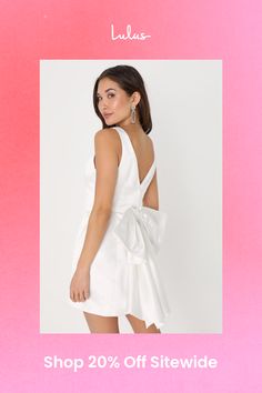 The Lulus Charming Celebration White Taffeta Bow Mini Dress has a whole lot of glamour that is sure to make you the talk of any social soiree this season! Sleek and structured woven taffeta shapes this iconic dress that features wide straps that support a princess-seamed bodice and a V-neck (and back). The fitted waist tops a figure-skimming skirt that falls to a flirty mini hem. Turn around to reveal an eye-catching oversized bow detail, that secures via snap closures for easy on-and-off! Hidde Bow Mini Dress, Lulu Fashion, Iconic Dresses, Bow Dress, The Talk, Personal Marketing, Dress 100, Wide Straps, Dress With Bow