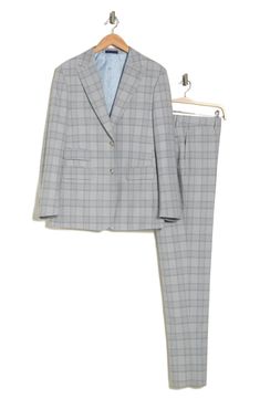 Sophisticated peaked lapels smarten the jacket of this trim-fit suit paired with flat-front trousers and finished in a handsome plaid print. 36 1/4" inseam; 7 3/4" leg opening; 10 1/2" rise (size 38R) Jacket has peaked lapels; chest welt pocket; front flap pockets Unhemmed Lined 70% polyester, 28% rayon, 2% spandex Dry clean Imported Single-breasted Pantsuit With Suit Collar, Tailored Pantsuit With Welt Pockets And Suit Collar, Tailored Suits With Lapel Collar For Office Wear, Workwear Suits With Lapel Collar, Tailored Notch Lapel Pantsuit For Semi-formal Occasions, Single Breasted Fitted Sets For Workwear, Suiting Fabric Suits With Lapel Collar For Work, Fitted Single Breasted Sets For Workwear, Business Casual Three-piece Suit With Suit Collar For Spring