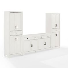 an image of a white bedroom set with drawers and cupboards on the wall in front of it