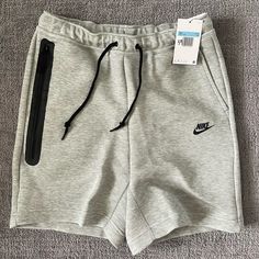 Brand New With Tags, Grey Gray, M Medium Nike Sporty Activewear With Side Pockets, Nike Gray Joggers For Gym, Nike Athletic Shorts With Pockets For Streetwear, Casual Fleece Sports Shorts, Nike Sporty Gray Joggers, Sportswear Jogging Shorts With Pockets, Sporty Fleece Sports Shorts, Sportswear Athletic Shorts With Pockets For Jogging, Sporty Gray Fleece Activewear