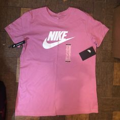 Brand New With Tags Womens Nike Icon Logo Short Sleeve T-Shirt Item Is Brand New And Has Never Been Worn Or Used No Scratches, Scuffs Or Snags Size M Color Pink Casual Pink Tops With Logo, Casual Sports Shirt For Spring, Spring Sports Cotton Shirt, Casual Sports Polo Shirt, Spring Sports Casual T-shirt, Adidas Graphic Tee For Streetwear, Casual Sports T-shirt For Spring, Pink Short Sleeve Sportswear T-shirt, Casual Spring Sports T-shirt