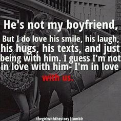 a man standing in front of a train with the words, he's not my boyfriend