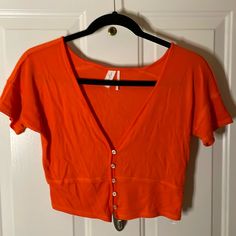 Nwot Out From Under Viscose/Elastane Short Sleeve, V-Neck, Button Up, Crop Top, Orange, Size L V-neck Tops With Button Closure For Day Out, Trendy V-neck Top With Buttons, V-neck Top With Buttons For Day Out, Summer V-neck Tops With Buttons, V-neck Tops With Buttons, V-neck Tops With Button Closure For Spring, Spring V-neck Tops With Button Closure, Orange V-neck Top With Buttons, Orange Tops With Buttons For Day Out