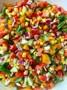 a white bowl filled with assorted veggies