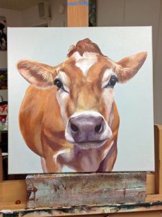 a painting of a cow's face is shown