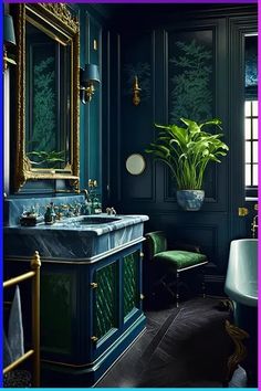 a bathroom with green walls and gold trim