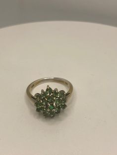 Rich and very bright Peridot green ring Sterling silver with rhodium finish Size 7 can be sized by my jeweler. His service charge is $10 All rings are shipped in a nice gift box. Check out our over a THOUSAND great reviews!!! Engraving is $4 per letter and is not always perfect depending on the piece. It can take a few days if the jeweler is busy. This is payable to Paypal Judithsltd@gmail.com Classic Green Cluster Diamond Ring, Green Cluster Diamond Ring With Gem, Green Cluster Diamond Ring Fine Jewelry, Classic Green Cluster Emerald Ring, Green Cluster Diamond Ring For Anniversary, Lime Green Sterling Silver Rings As Gift, Lime Green Sterling Silver Rings For Gift, Green Cluster Diamond Ring With Prong Setting, Green Diamond Cluster Ring With Prong Setting