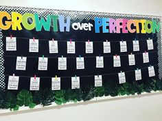 a bulletin board with notes pinned to it that says growth over perpetion and plants