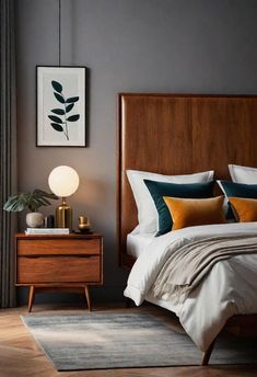 a bedroom with a bed, nightstand and painting on the wall above it's headboard