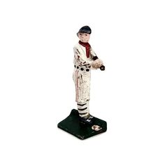 a figurine of a baseball player holding a bat