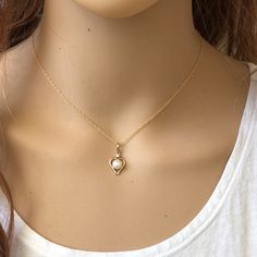 14k Solid Gold Mini Heart Pearl Pendant Charm Necklace Metal: 14k Solid Gold (Stamped 14k) Length: 16"-18" Adjustable Pendant: With Bale 20 X 10 Mm . Stones: 6 Mm Pearl And Cz Est. Weight: 2.28 Grams Brand New With Box #7250 Elegant 14k Gold Heart Necklace With Birthstone, Delicate Heart Necklace With Pearl Pendant, Elegant 14k Stamped Heart Pendant Necklace, Elegant 14k Stamped Heart Necklace Gift, Dainty Heart Necklace With Pearl Pendant For Anniversary, Dainty Yellow Gold Heart Necklace With Birthstone, Elegant 14k Gold Heart Pendant Charm Necklace, 14k Yellow Gold Heart Necklace For Wedding, 14k Gold Heart Necklace With Birthstone For Wedding