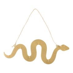 a gold snake hanging on a string