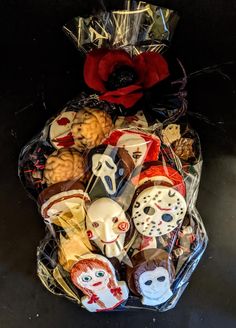 a bag filled with assorted halloween cookies