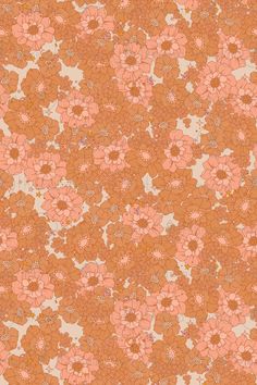 an orange and pink flowered background with small white dots on the bottom right corner