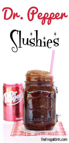 dr pepper slushes in a mason jar with a pink straw