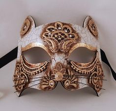 Decorated with lace, passamenterie, pearls, metal filigree and crystal stones. Perfect for a masquerade ball, Halloween or Carnival. All models are made in Italy🇮🇪 and distributed in the United States   Our masks are made according to the most ancient Venetian techniques and with the most innovative materials in the sector. Each mask is a unique work of craftsmanship that arrives directly to your home, created and customized just for you. With this mask you will impress everyone at any ball or Cat Mask Ideas, Innovative Materials, Punk Skull, Venetian Mask, Mask Ideas, A Punk, Cat Mask, Costume Masks, Masquerade Party