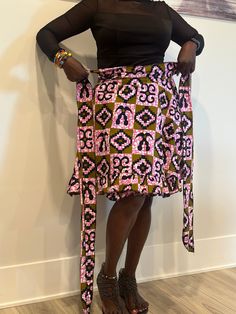 Embrace Africa's bright energy with this gorgeous Ankara wrap skirt. This adaptable item, made of high-quality Ankara cloth, allows for unlimited style options. Whether you like the casual elegance of a maxi, the whimsical appeal of a mini, or the graceful flow of a midi, our wrap skirts are suitable for every style and occasion. The wrap shape offers a great fit for all body types, and the bright Ankara prints lend an exotic flare. Our Ankara wrap skirts are the definition of easy style, whether on a casual day or at a formal event. Discover the charm of African fashion and upgrade your wardrobe now. Features ✨Wrap style, versatile length options, vibrant Ankara prints, comfortable fit. ✨Perfect for: Casual wear, special occasions, office attire. ✨Pair with a simple top and statement acce Fitted Multicolor Ruffled Mini Skirt, Multicolor Fitted Long Wrap Skirt, Fitted Multicolor Tiered Wrap Skirt, Multicolor Relaxed Flared Wrap Skirt, Fitted Multicolor Lined Wrap Skirt, Multicolor Tiered Wrap Skirt With Lining, Multicolor Tiered Lined Wrap Skirt, Flowy Multicolor Tiered Wrap Skirt, Multicolor Flowy Tiered Wrap Skirt