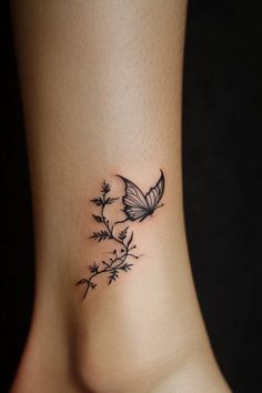 a black and white photo of a butterfly on the side of a woman's stomach