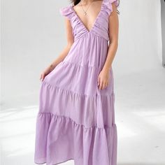 Long Purple Dress Size L From Grey Bandit! Never Worn, Brand New With Tags Lavender V-neck Maxi Dress For Spring, Lavender Cotton Dress With Ruffles, Summer Purple Maxi Dress For Casual Wear, Purple Maxi Dress For Summer, Purple Ruffled Maxi Dress For Spring, Purple Maxi Dress For Casual Summer Wear, Purple Tiered Beach Dress, Chic Lavender Maxi Dress For Brunch, Spring Lavender Maxi Dress