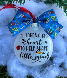 it takes a big heart to help shape little minds christmas ornament on snow