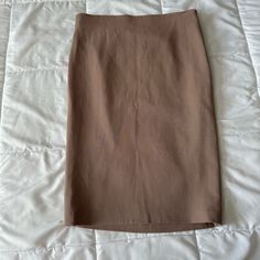 New With Tags Brunello Cucinelli Biscotti Tan Virgin Wool Pencil Skirt Size It 48 / Us 12 Tan Nude Color - Biscotti 96% Virgin Wool 4% Elastane Made In Italy Approximate Flat Laying Measurements Waist: 16.75” Length: 27” Brown Midi Skirt For Formal Occasions, Formal Brown Midi Skirt, Brown Knee-length Skirt For Formal Occasions, Formal Brown Knee-length Skirt, Elegant Brown Lined Mini Skirt, Elegant Brown Skirt For Workwear, Formal Brown Lined Skirt, Brown Lined Skirt For Formal Occasions, Elegant Brown Skirt For Work