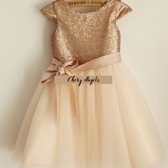 Champagne sequin on the top with matched champagne tulle skirt Cap sleeves with a champagne detachable satin belt  The whole dress is fully lined with soft satin so it is not against the skin at all This dress is suits for flower girls, as communion dress or any occasion. Simple but elegant dress. Golden Dress For Girls, Cream Princess Dress With Tulle Skirt For Party, Golden Dress, Etsy Wedding Dress, Pink Tulle, Gold Dress, Birthday Dresses, Elegant Dress, Tulle Dress