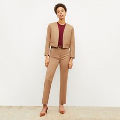 This chic suiting staple features clean lines, a slightly cropped hemline, an internal pocket, and strategically placed seams designed to flatter. Want to complete the suit? Shop all mix and match pieces in this fabric . Modern Tailored Long-sleeve Pantsuit, Modern Tailored Long Sleeve Pantsuit, Tailored Structured Office Pantsuit, Tailored Structured Pantsuit For Office, Structured Fitted Cropped Jacket For Fall, Fitted Structured Cropped Jacket For Fall, Fall Structured Fitted Cropped Jacket, Classic Cropped Formal Outerwear, Classic Tailored Fall Pantsuit