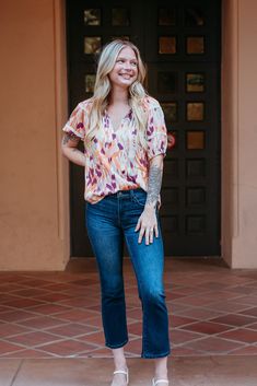 Elevate your wardrobe with this vibrant, patterned top. Featuring a playful mix of warm hues, this blouse is perfect for adding a pop of color to any outfit. The relaxed fit and lightweight fabric ensure comfort, while the gathered neckline and short sleeves offer a flattering, feminine touch. Pair it with your favorite jeans for a chic, effortless look. Ideal for casual outings or a stylish day at the office. Gathered Neckline, Short Puff Sleeve, Natural Clay, Floral Bodycon, Denim Romper, Cropped Flares, Denim Flares, Denim Pant, Winter Looks