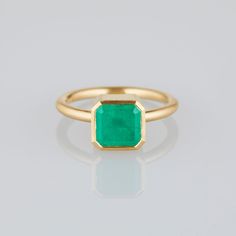 18K Yellow Gold Elegant 22k Gold Jewelry With Bezel Setting, Timeless Octagon Emerald Ring In Yellow Gold, Timeless Gold Emerald Birthstone Ring, Yellow Gold Emerald Ring As Gift, Luxury Gold Solitaire Emerald Ring, Gift Emerald Ring In Yellow Gold, Gift Yellow Gold Emerald Ring, Handmade Yellow Gold Emerald Ring For May Birthstone, Luxury Yellow Gold Emerald Ring Gift