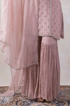 Onion pink kurta with detailed cut-dana embroidery. Paired with a sharara and scallop trimmed dupatta. - Aza Fashions Pink Palazzo Set With Dori Work, Pink Sharara With Dori Work, Fitted Pink Palazzo Set With Gota Work, Pink Straight Kurta Sharara For Reception, Pink Sharara With Straight Kurta For Reception, Pink Straight Kurta Set For Reception, Elegant Pink Palazzo Set With Dori Work, Pink Fitted Sharara With Gota Work, Fitted Pink Sharara With Gota Work