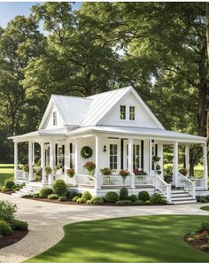 a white house with porches and flowers on the front