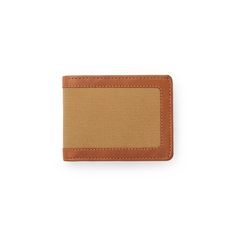 A new take on an old favorite – our Outfitter Wallet is made of proprietary Weatherproof Leather and Rugged Twill. Heavy-duty nylon thread holds up to years of daily use. | Filson Rugged Twill Outfitter Wallet Tan Durable Bifold Wallet For Everyday Use, Beige Rfid Blocking Bifold Wallet, Casual Beige Travel Wallet, Everyday Beige Bifold Wallet, Casual Beige Wallets, Filson Bags, Fold Wallet, Bifold Wallet, The Outdoors