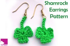 a pair of green crocheted shamrock earrings