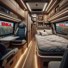 the interior of an rv with two beds and televisions on either side of it