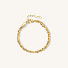 The bracelet we’d wear on a summer trip to Rio. This shimmery rope chain is sturdy and luxe. You loved the necklace so much, this best selling piece is now available as a bracelet. Texture + sparkle all wrapped into one bracelet. 18k Gold plated stainless steel Psst: This piece utilizes durable stainless steel that's tarnish/water resistant - feel free to wear it 24/7! Thickness: 3 mm Length: 6” + 1” extender Gold Rope Chain Bracelet, Adjustable Gold Rope Chain Bracelet, Minimalist Rope Chain Bracelet For Everyday, Minimalist Rope Chain Bracelets For Everyday, Minimalist Rope Chain Bracelets, Everyday Gold Rope Chain Bracelet, Adjustable Rope Chain Bracelet As Gift, Adjustable Rope Chain Bracelet For Gift, Everyday Rope Chain Bracelet