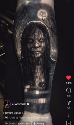 a person with a tattoo on their arm that is covered in black and white ink