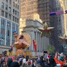 people are taking pictures of floats in the street