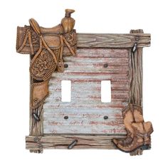 an old western light switch plate cover