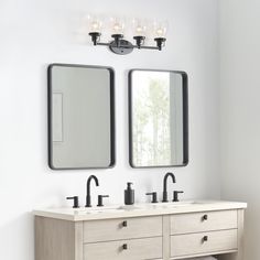 Usually ships in within 7 to 10 days when in stock. Live chat to confirm stock.Influenced by the vintage industrial designs of early 20th Century America, the transitional Belton lighting series has seeded glass shades and Midnight Black finish, adding a layer of retro design to the warm look.The Belton four light vanity fixture in midnight black provides abundant light for your bath vanity, while adding a layer of today's style to your interior design. Influenced by the vintage industrial desig Bathroom Wall Light Fixtures, Elegant Vanity, Vintage Industrial Design, Vanity Light Fixtures, Sea Gull Lighting, Generation Lighting, Bathroom Vanity Light, Bathroom Sconces, Bathroom Wall Lights