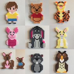 a bunch of different pixelated animals on a wall